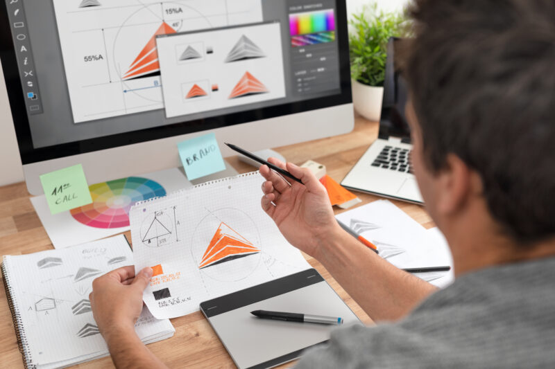 Graphic,Designer,Drawing,Sketches,Logo,Design.,The,Concept,Of,A
