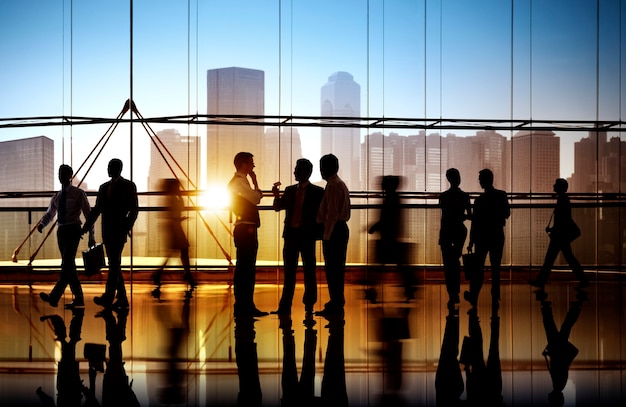 Free photo busy business people walking