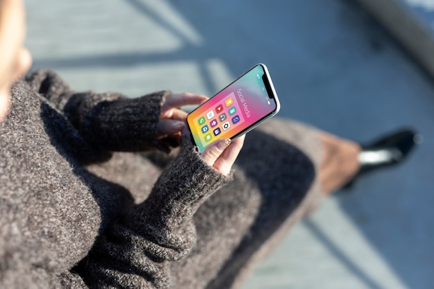 Free photo woman using smartphone technology